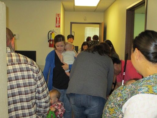 Families are trick or treating the office and getting candy